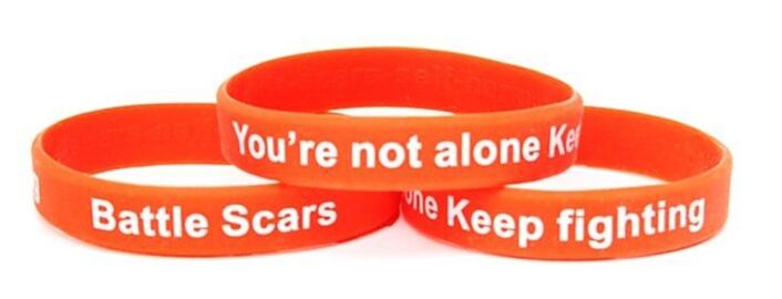 Battle Scars wristbands 3 on a white background 